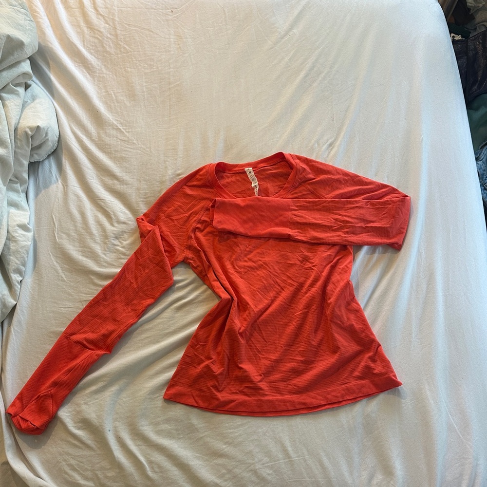 Lululemon Athletica Orangey/Red Fitted Long Sleeve Blouse